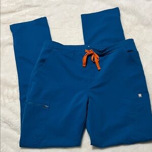 Figs Blue Scrub Bottoms with Orange Drawstring. Size Medium Tall. **As is**
